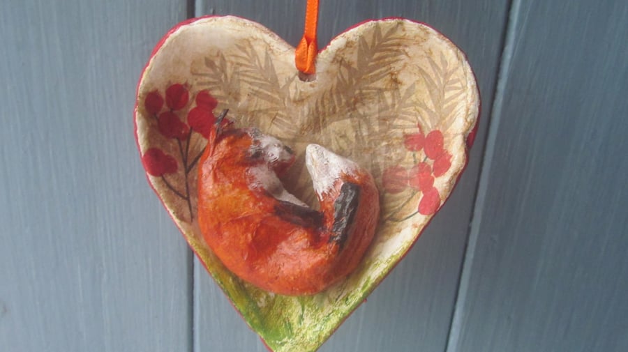 Snoozing fox heart shaped paper mache decoration