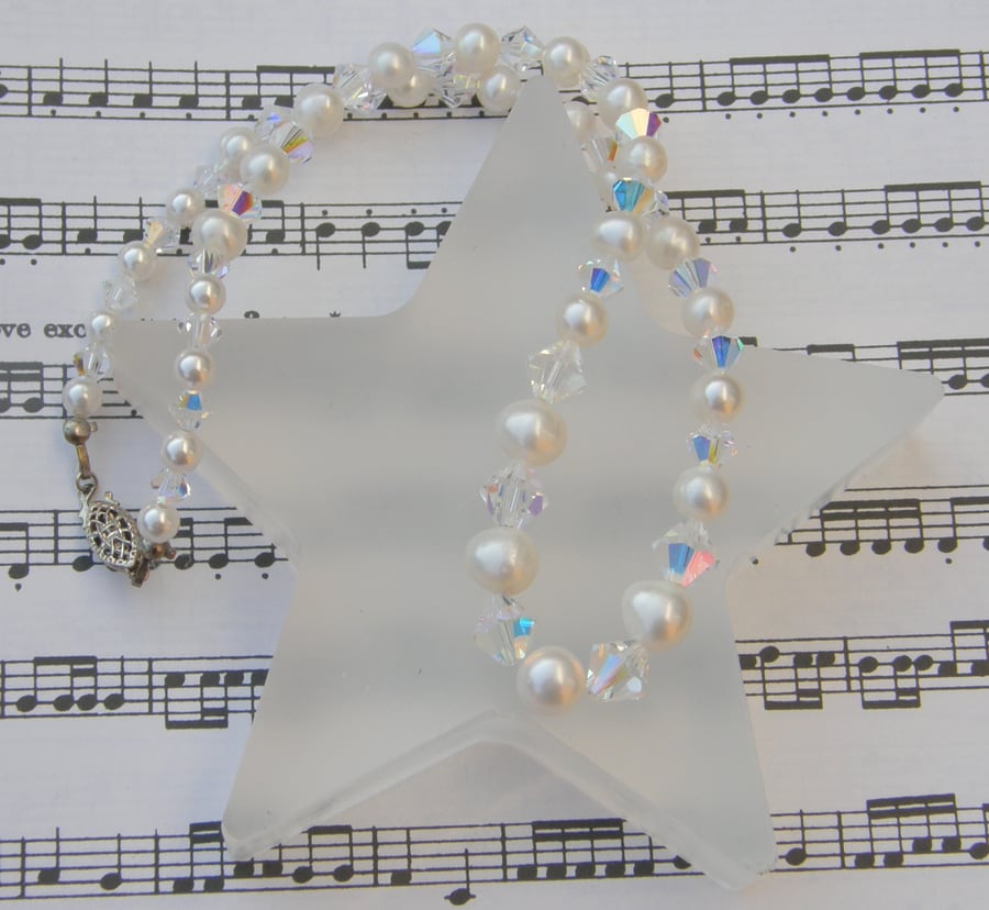 Swarovski clear AB crystal and ivory freshwater pearl necklace.