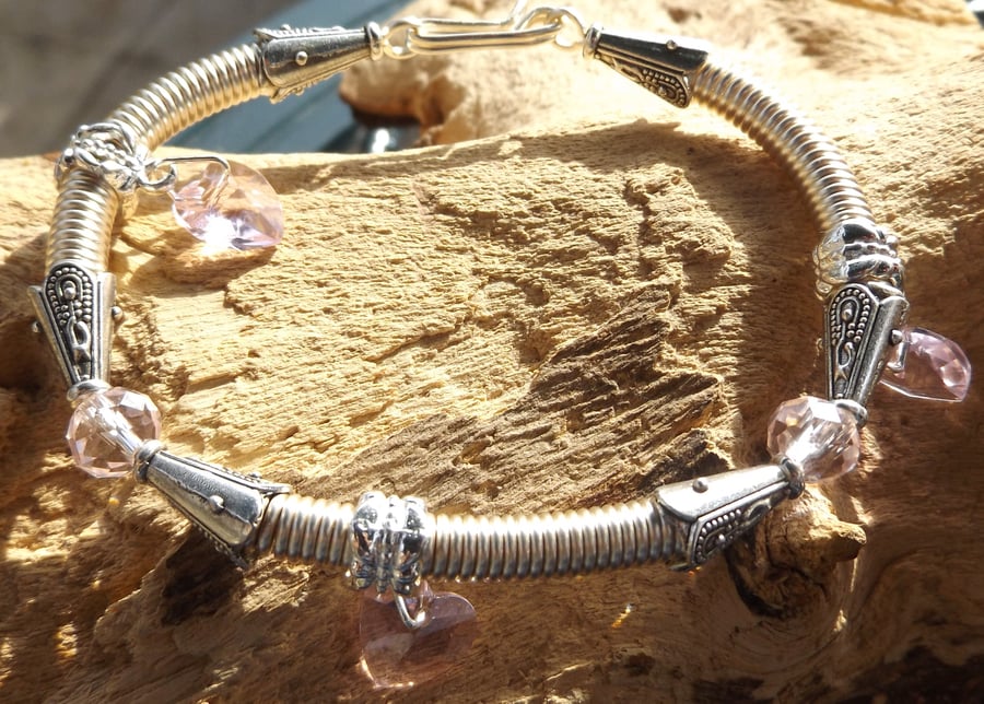 Silver plated pink crystal heart charm gizmo wire bracelet