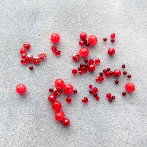 Assorted red beads