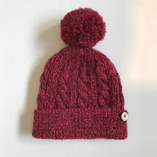 Hand knitted Child's Hat with pompom in burgundy -  4 to 7 years