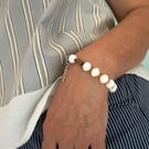 Glass bead bracelet in crisp white vintage beads with extension chain