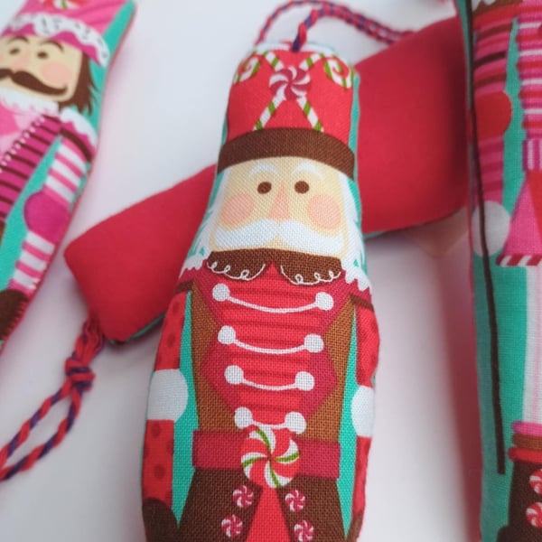 Nutcracker Christmas Decoration - hanging stuffed soldiers in red and pink
