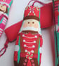 Nutcracker Christmas Decoration - hanging stuffed soldiers in red and pink