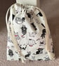 Small cat themed black and white drawstring pouch bag - Image 2