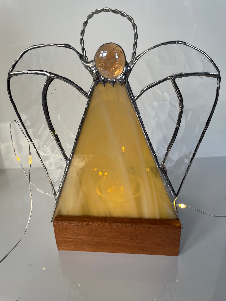 Stained glass angel tealight holder.