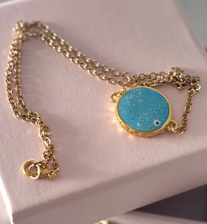 Gold Plated necklace, with Turquoise Glittering Evil Eye. 