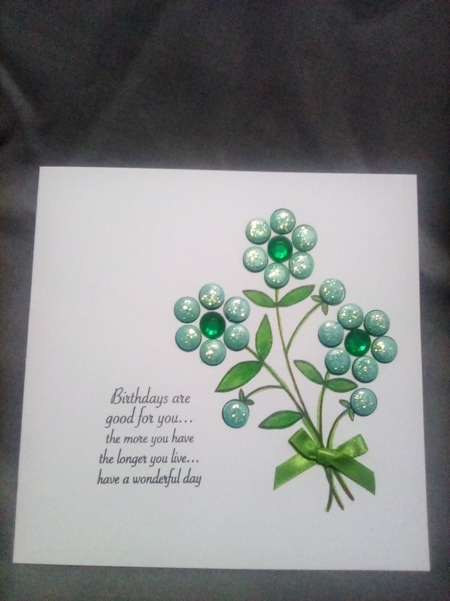 A beautiful unique floral watercolour and embellished handmade Birthday card
