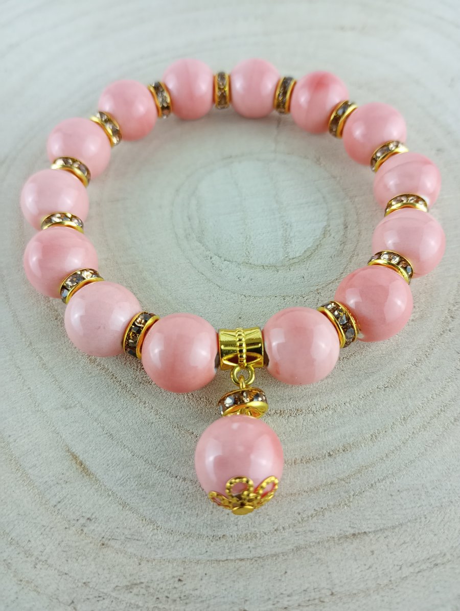 Peach Ceramic Elasticated Bracelet With Rhinestone Spacers & Drop Bead Charm 