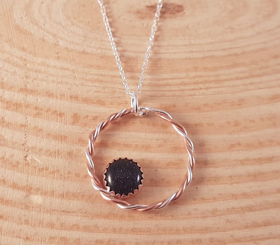 Sterling Silver and Copper Twisted Circle with Copper Set Blue Goldstone