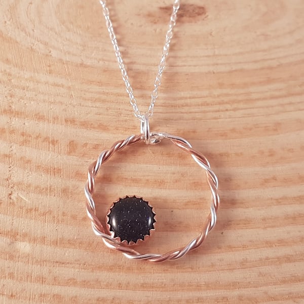 Sterling Silver and Copper Twisted Circle with Copper Set Blue Goldstone