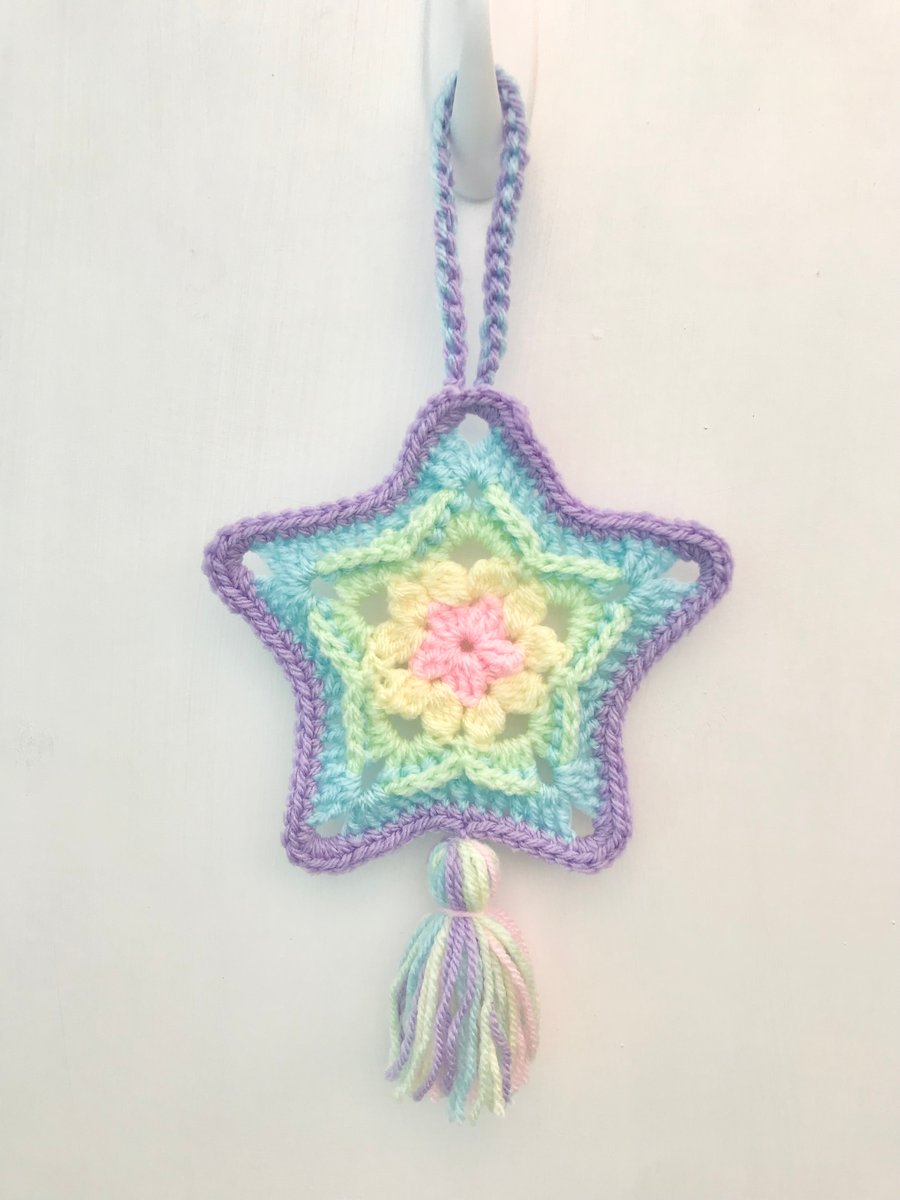 Pastel rainbow star crochet hanging decoration with tassel