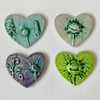 4 botanical heart shaped ceramic tiles