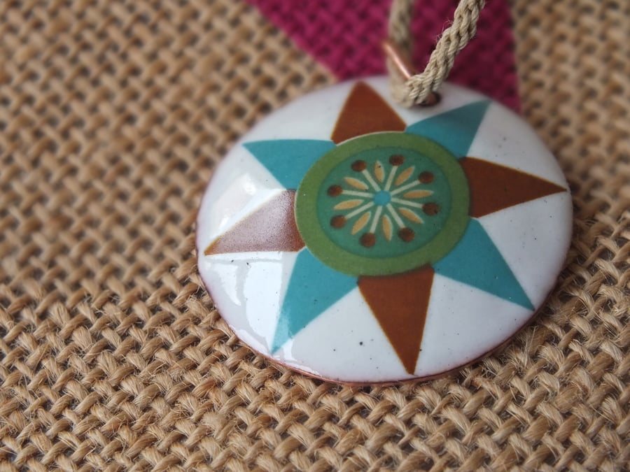 Folky quilt style star design enamelled pendant