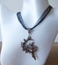 Black Ribbon & Cord Adjustable Necklace with Witch & Vine Covered Moon Pendant - Image 3