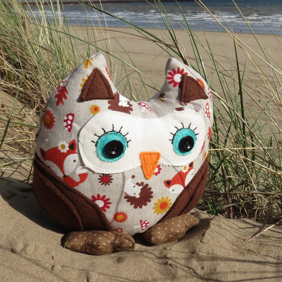 Bracken, a whimsical owl doorstop.  Owl bookend.