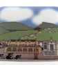 Glass coaster featuring Settle - Image 1