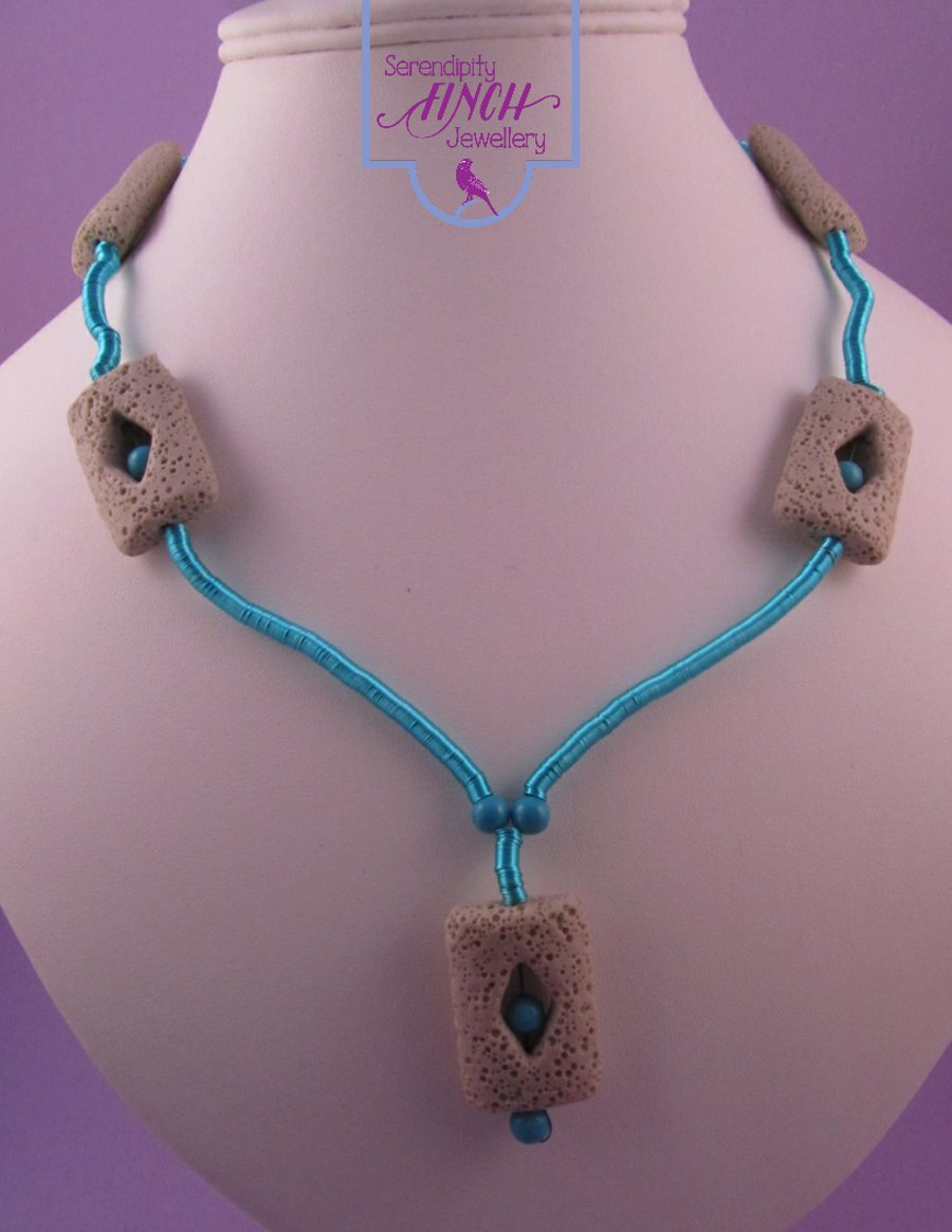 Cream Lava Rock Blue Wire Necklace