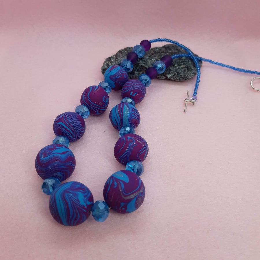 Brightly coloured magenta and turquoise necklace and earrings set