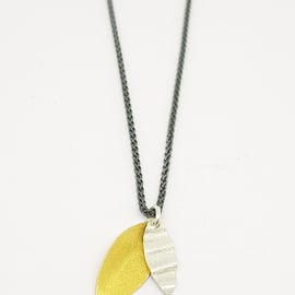 Pilar by Fedha - double leaf pendant in silver and vermeil, oxidised spiga chain