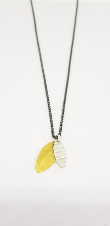Pilar by Fedha - double leaf pendant in silver and vermeil, oxidised spiga chain