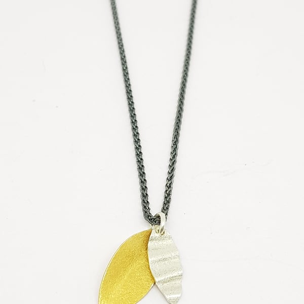 Pilar by Fedha - double leaf pendant in silver and vermeil, oxidised spiga chain