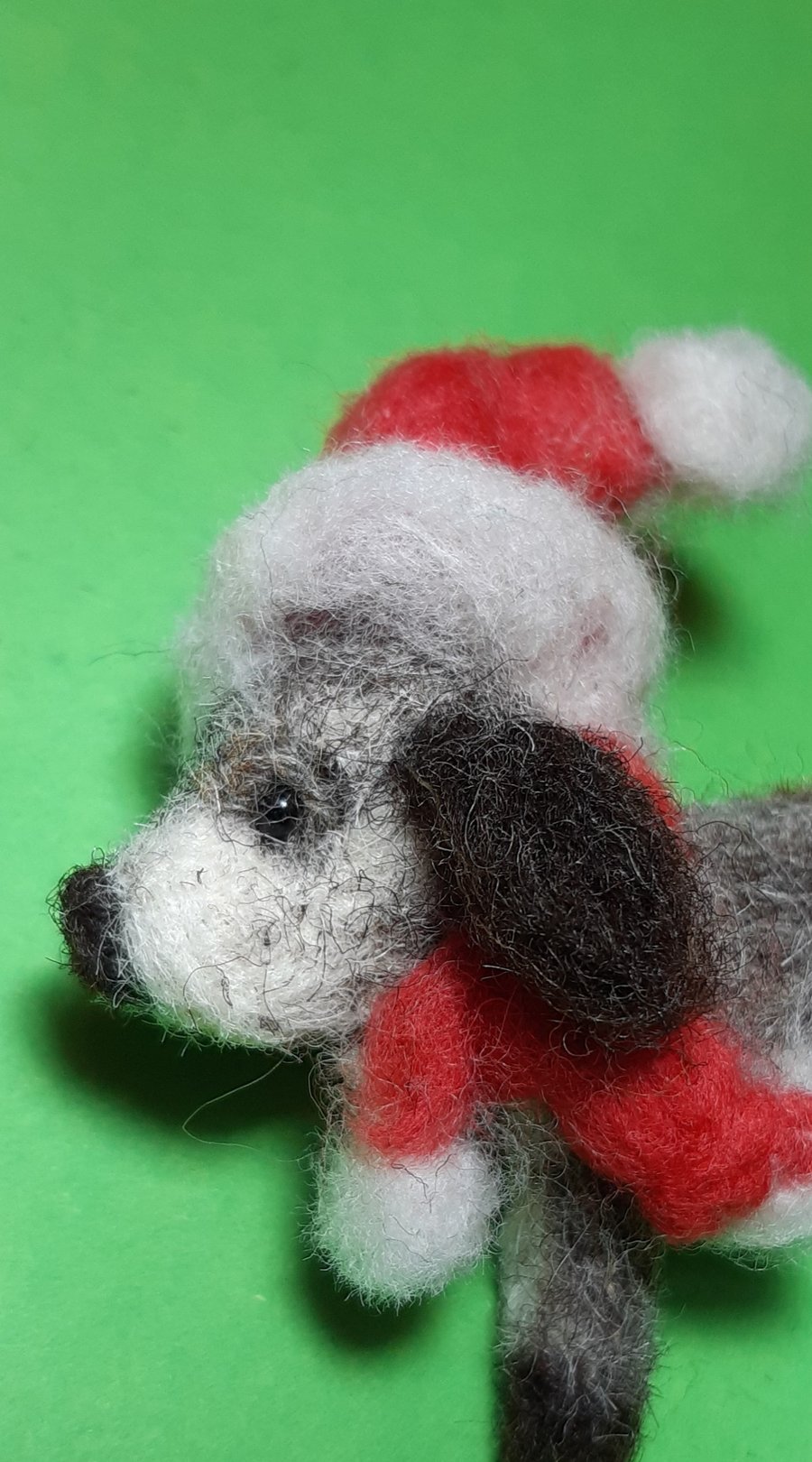 Christmas santa dog brooch. Dog wearing hat and scarf.