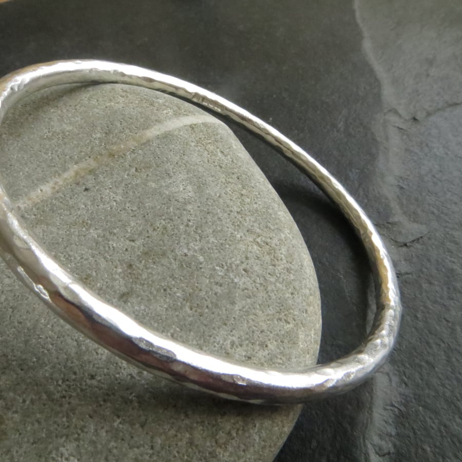 Heavy sterling silver bangle with lightly textured finish