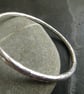 Heavy sterling silver bangle with lightly textured finish - Image 1