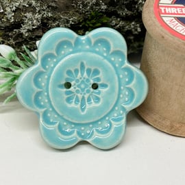 Large ceramic flower shaped button pale blue