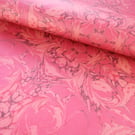 Rococo swirls design wrapping paper in red and yellow