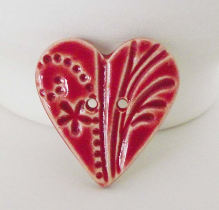 Large red heart shaped ceramic button