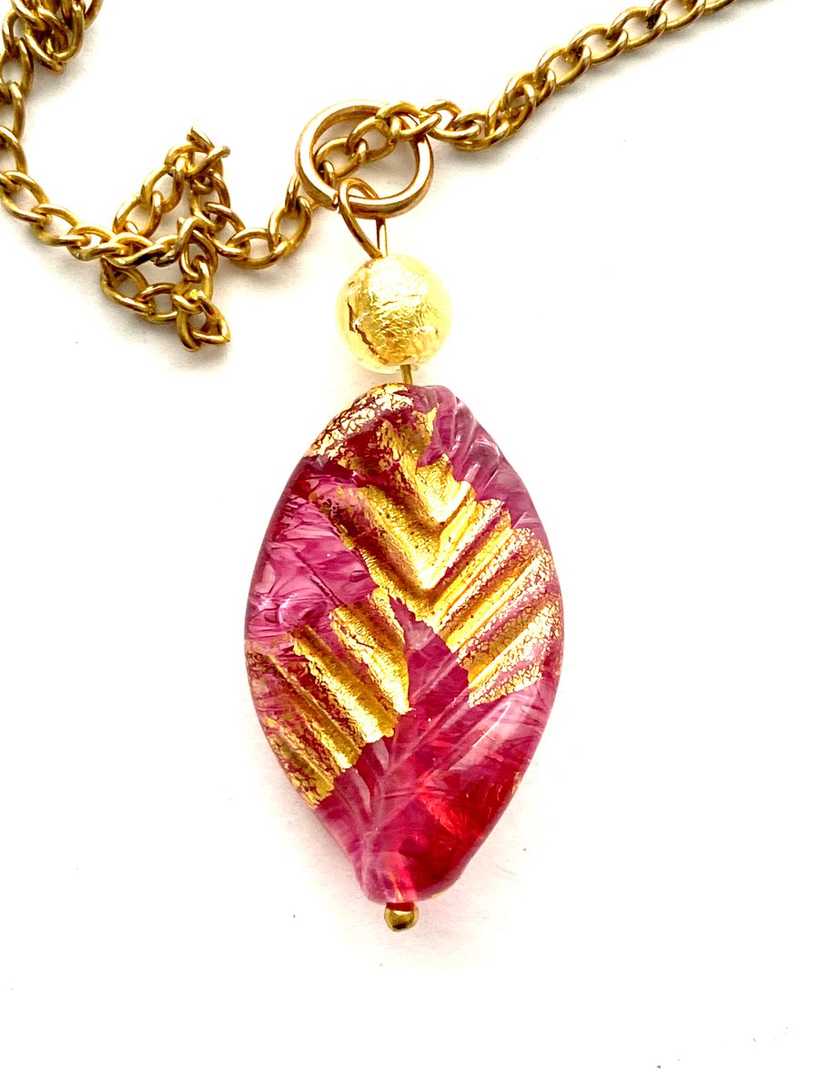 Murano Glass pink and gold Murano Glass leaf pendant with gold chain.