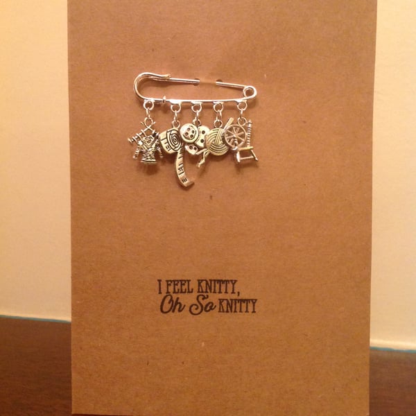 A6 kraft card with a detachable kilt-pin brooch