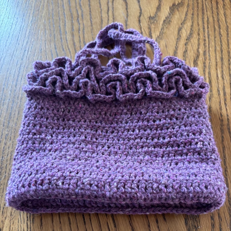 Small crochet frilly lined handbag made from recycled wool blend yarn