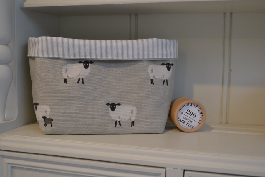 Fabric Basket in Sophie Allport Sheep with Striped lining folds flat for storage