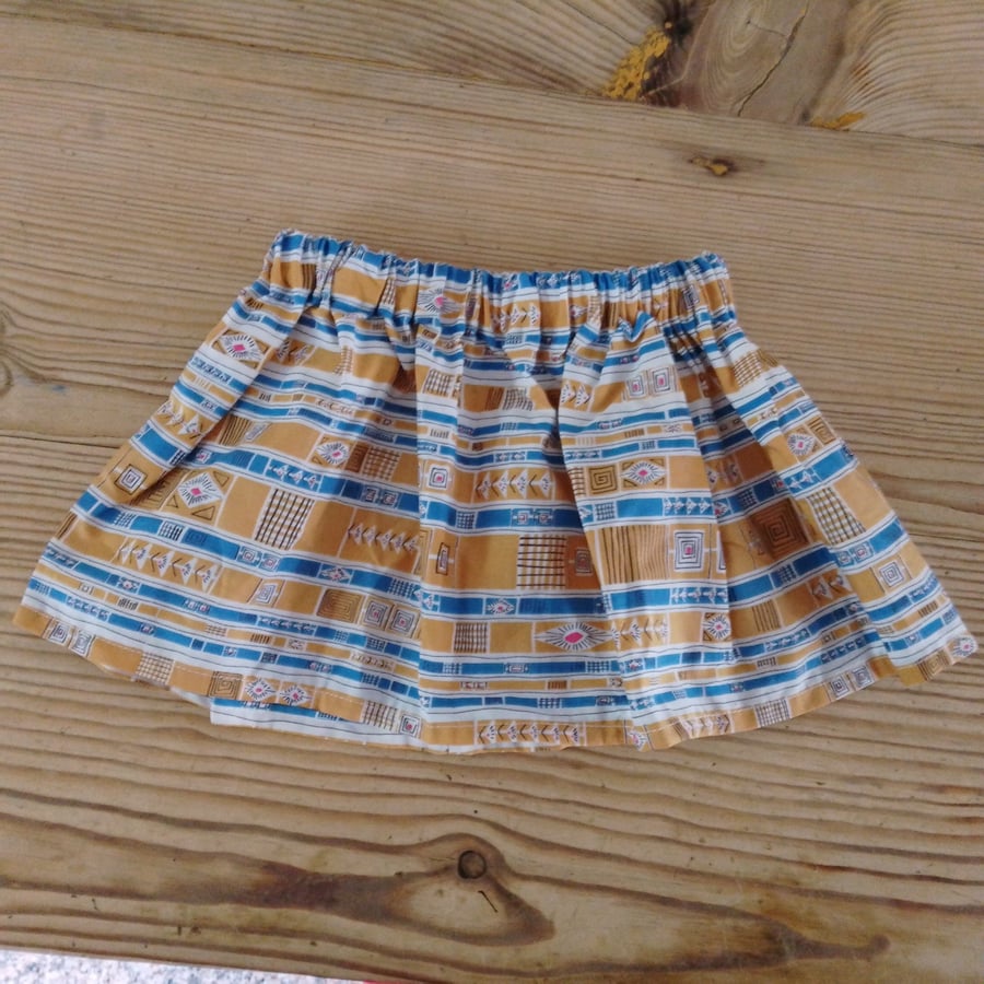 Baby skirt handmade in mustard and blue abstract pattern fabric aged 6-9 months