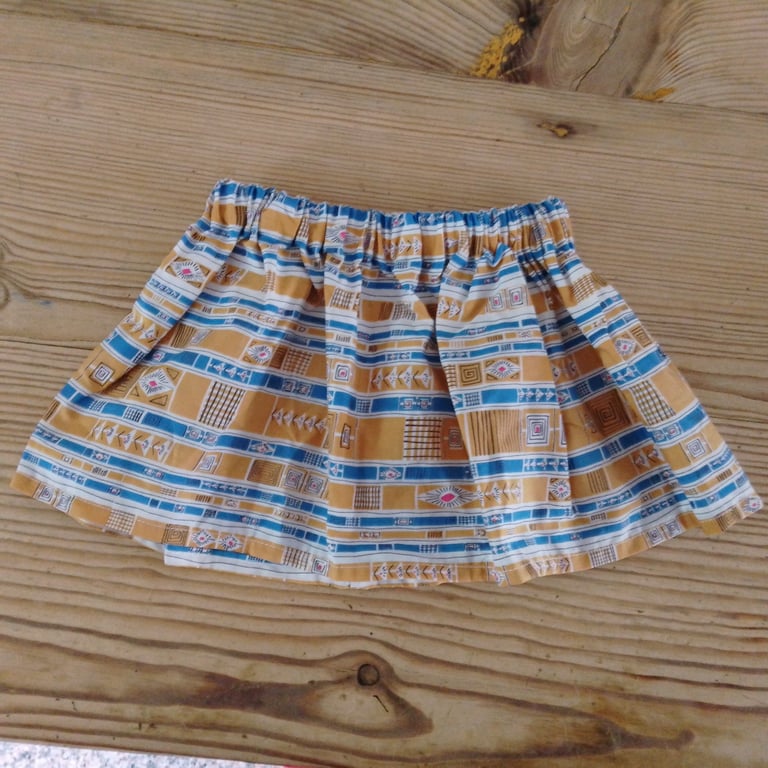 Baby skirt handmade in mustard and blue abstract pattern fabric aged 6-9 months