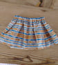 Baby skirt handmade in mustard and blue abstract pattern fabric aged 6-9 months