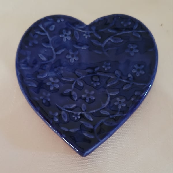 Floral embossed heart ring dish.