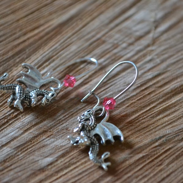 Dragon earrings with pink crystal