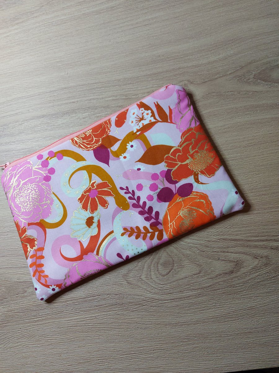 Snakes and flowers make up bag 