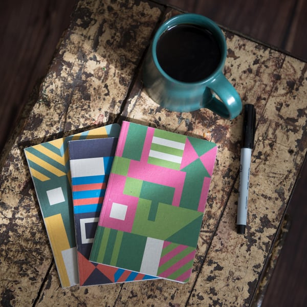 ARC01 Pack of three A6 pocket notebooks with graphic pattern covers
