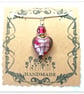 Dark pink Murano glass heart necklace on a silver plated chain - Image 3