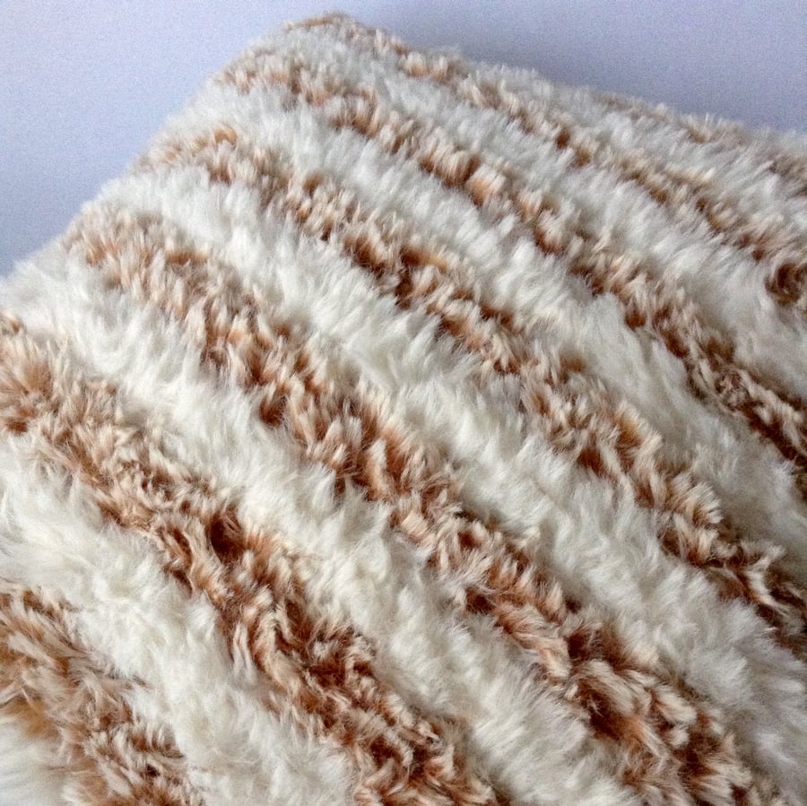 Hand-knitted fluffy cushion cover