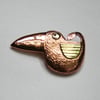copper bird brooch