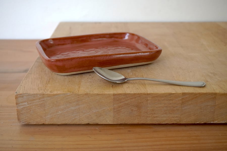 Handmade pink textured ceramic tray with rectangular shape