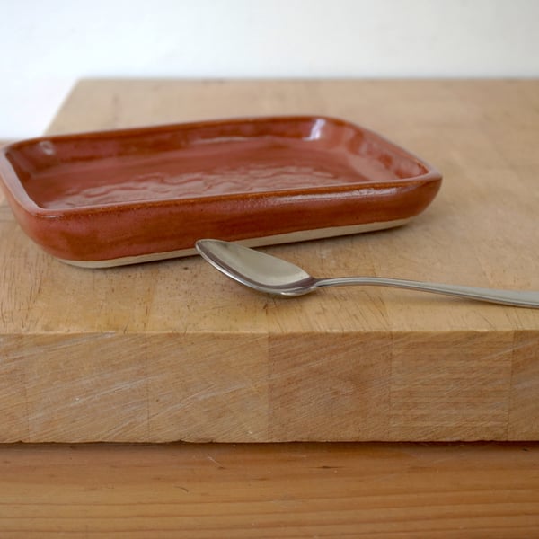 Handmade pink textured ceramic tray with rectangular shape
