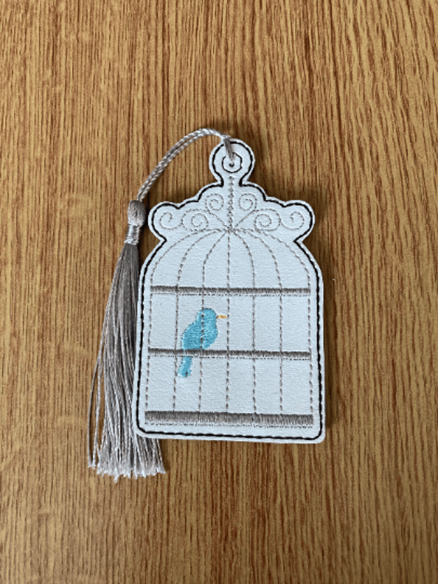 1279. Bird in cage bookmark.