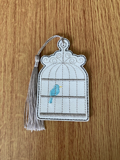1279. Bird in cage bookmark.